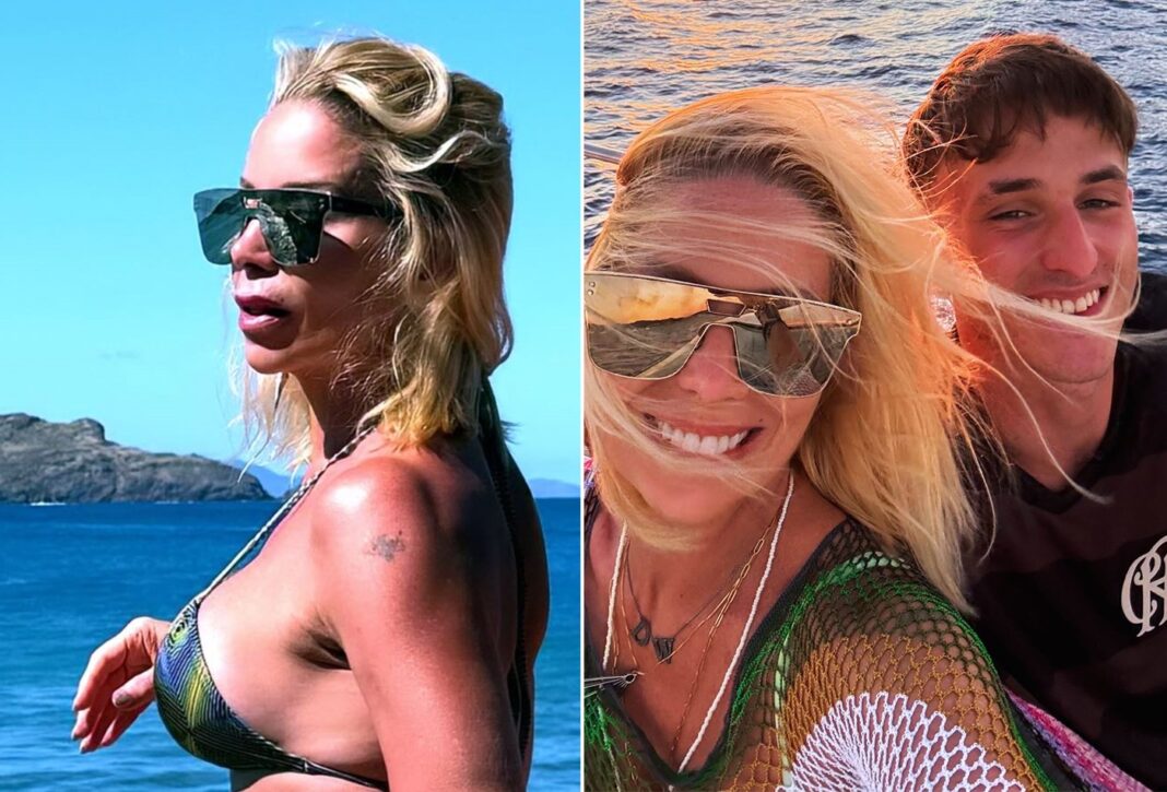 De biquíni, Danielle Winits passeia de lancha no Caribe com filho mais velho